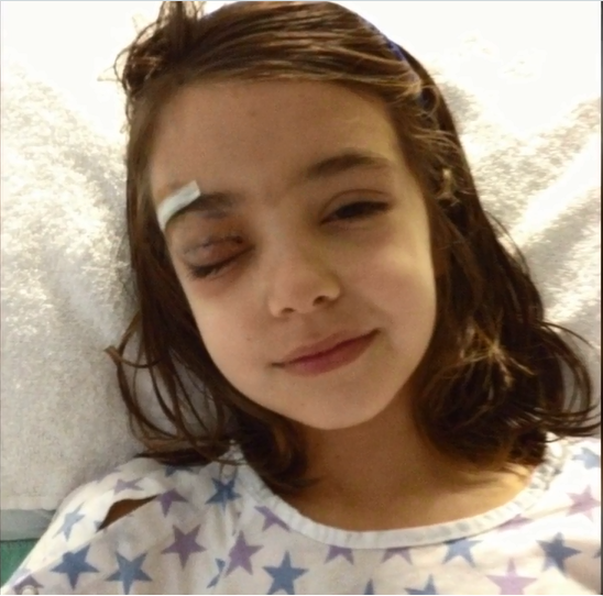 Girl after surgery for her eye.