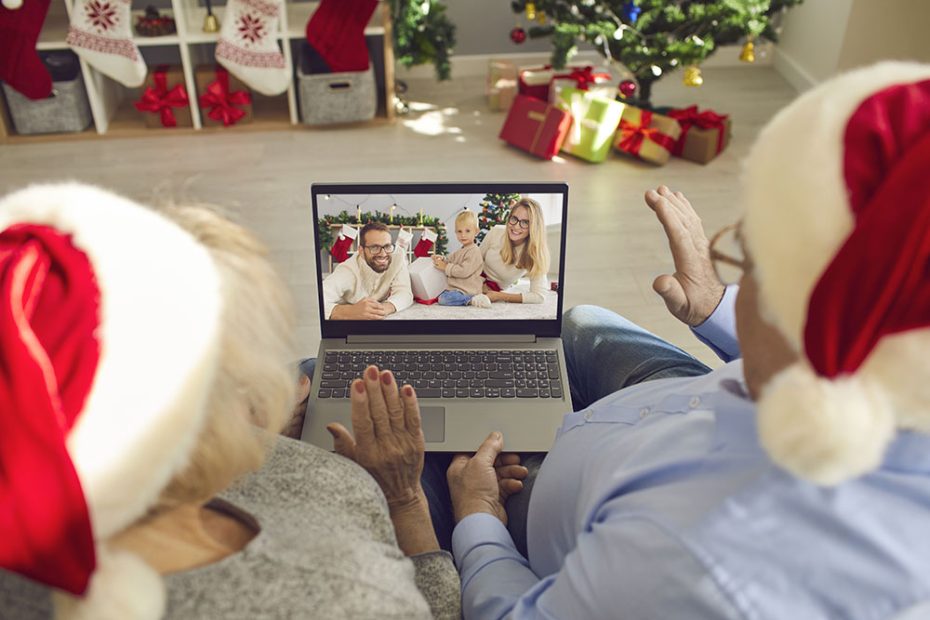Families video chatting on a laptop
