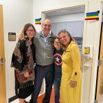 Picture showing Dr. Hartnick (center), Elliot (second to right) and Kate (far right) with a family friend during a visit to Mass Eye and Ear.