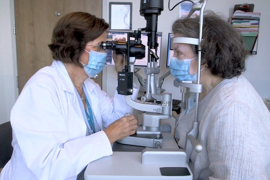 Joan W. Miller, MD, examines patient Laura Brennan at Mass Eye and Ear.